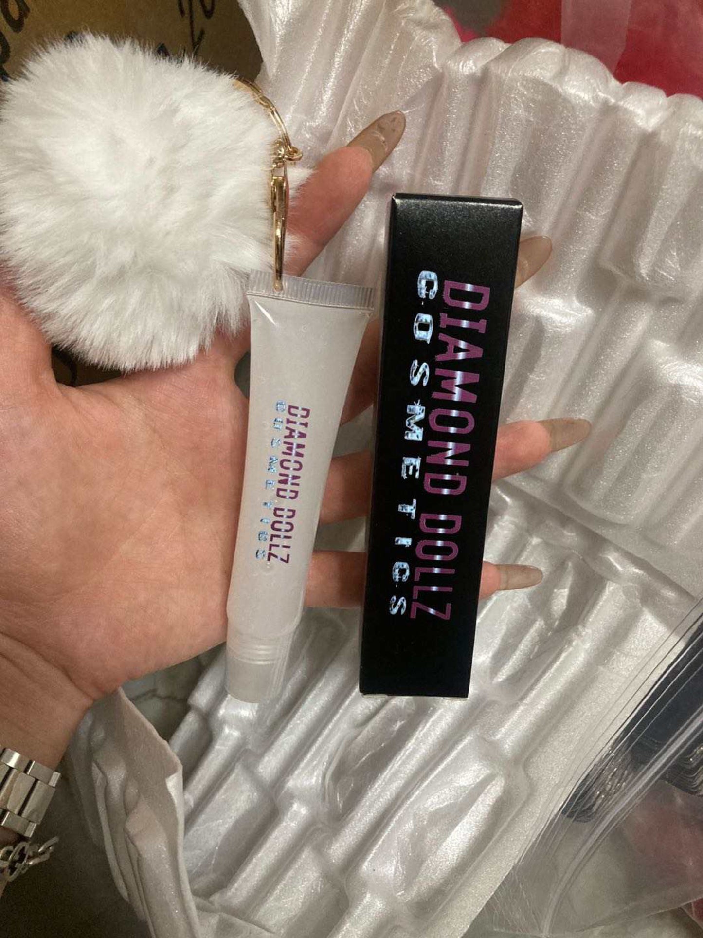 Lip oil with keychain