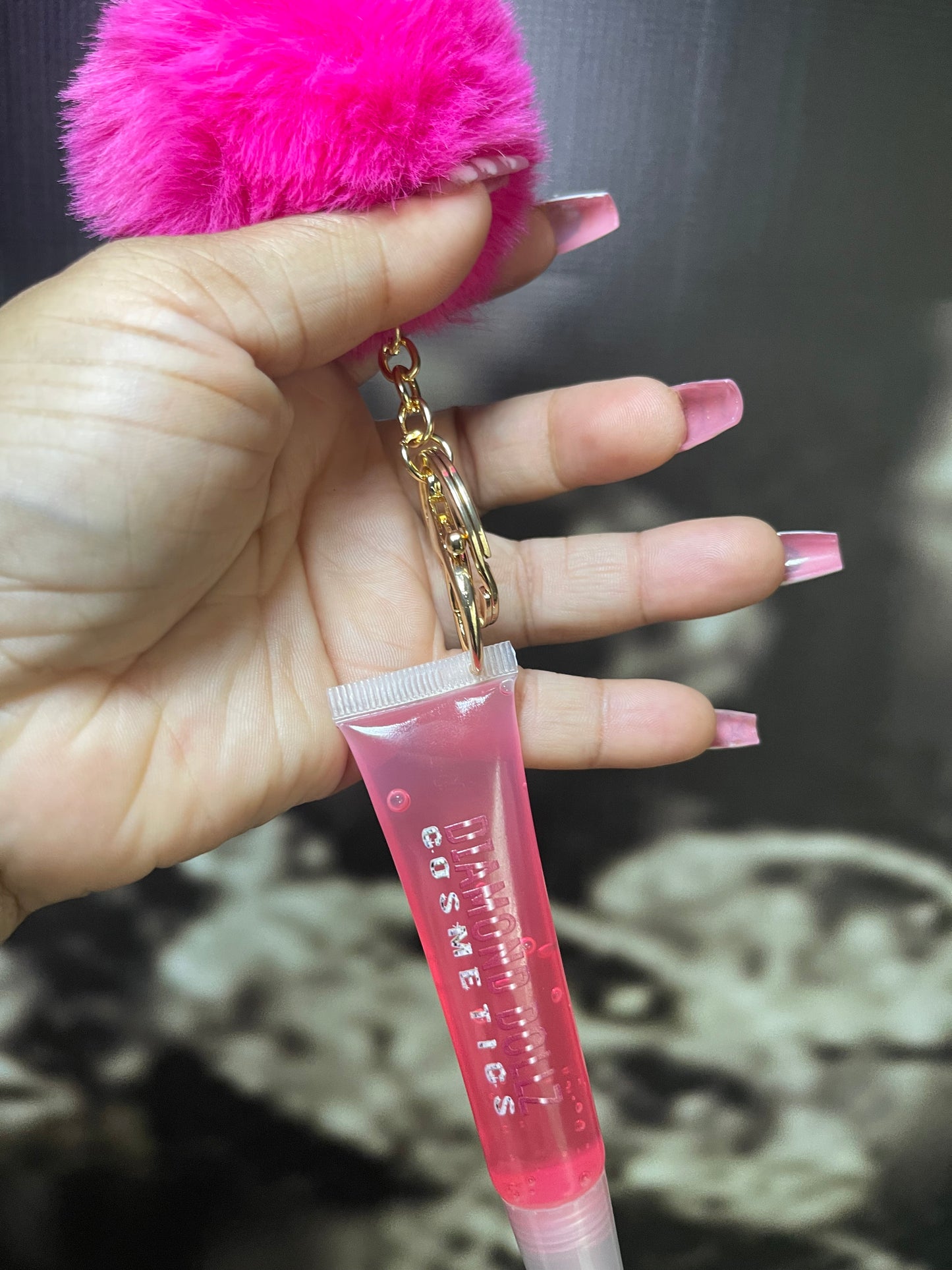 Lip oil with keychain